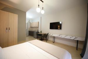 Postel nebo postele na pokoji v ubytování Hotel Erjuma