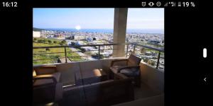 Un lugar para sentarse en Appartement dans une belle résidence à Bizerte superbe vue