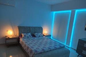 Una cama o camas en una habitación de Appartement dans une belle résidence à Bizerte superbe vue