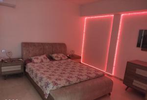 Una cama o camas en una habitación de Appartement dans une belle résidence à Bizerte superbe vue