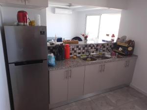 Una cocina o cocineta en Appartement dans une belle résidence à Bizerte superbe vue