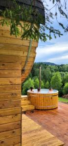 Balkón alebo terasa v ubytovaní Domki Bieszczady Siedlisko Harenda