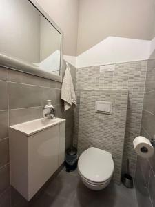 Kúpeľňa v ubytovaní Apartments Four You-with sea view