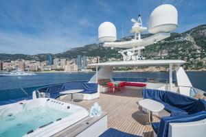 a deck of a boat with a hot tub on it at iRama Luxury Superyacht 6 Cabins & Hot Tub & Water Toys in Cannes