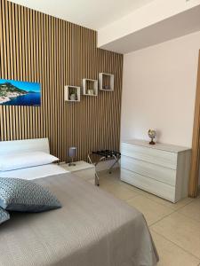 Letto o letti in una camera di Fabiria Guesthouse - B&B