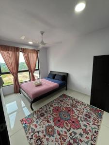 Ένα ή περισσότερα κρεβάτια σε δωμάτιο στο Qsara Home Gamuda Garden