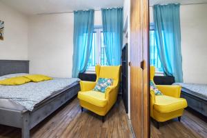 Posteľ alebo postele v izbe v ubytovaní Mahalo Apartment