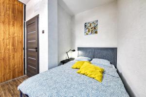 Posteľ alebo postele v izbe v ubytovaní Mahalo Apartment