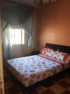 Cama ou camas em um quarto em Coopérative Village Jbel Moussa du Tourisme