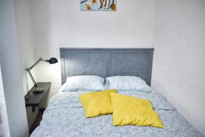 Posteľ alebo postele v izbe v ubytovaní Mahalo Apartment