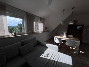 Posezení v ubytování Ferienwohnung Meinerzhagen + 7 fotografií