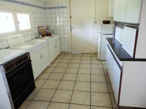 Kuchyň nebo kuchyňský kout v ubytování Domaine de Laroque Lou Maïsouet