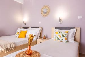 เตียงในห้องที่ PotamSea Bliss 3 - Beach Front, Sun Beds & Parking +19 ภาพ