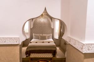 Postel nebo postele na pokoji v ubytování Riad Zayn & Spa
