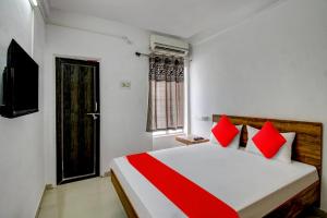 Postel nebo postele na pokoji v ubytování Super Hotel O The Golden Key