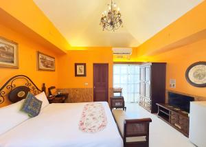 Postel nebo postele na pokoji v ubytování Ho Feng Private Hotel 電梯自助民宿
