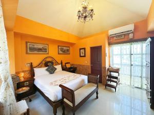 Postel nebo postele na pokoji v ubytování Ho Feng Private Hotel 電梯自助民宿