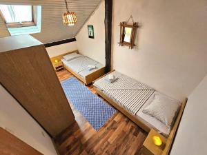 Postel nebo postele na pokoji v ubytování Apartments Marijana
