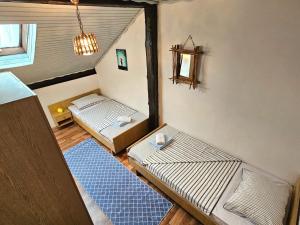 Postel nebo postele na pokoji v ubytování Apartments Marijana