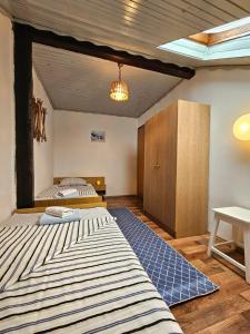 Postel nebo postele na pokoji v ubytování Apartments Marijana