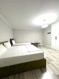 Postel nebo postele na pokoji v ubytování SPIRANCA Luxury Home