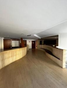 an empty room with a staircase in a building at Cap Salou CALA FONT in Salou