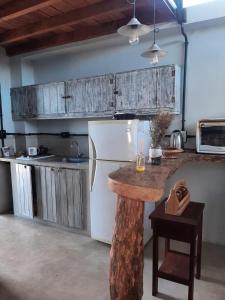 Η κουζίνα ή μικρή κουζίνα στο Ita Pora Lodge +9 φωτογραφίες
