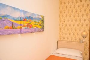 Postel nebo postele na pokoji v ubytování Hotel Ariston Riccione