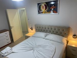 Postel nebo postele na pokoji v ubytování "Complex Delijorgji" Apartment