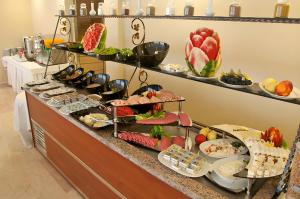 a buffet with many different types of food on display at Abel Hotel in Istanbul