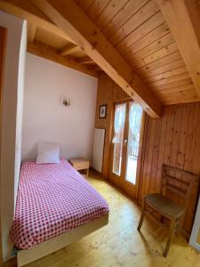 Postel nebo postele na pokoji v ubytování Auberge du Val des dix