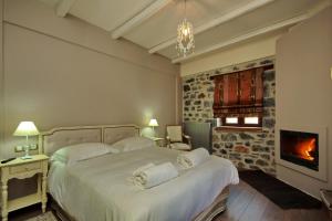Postel nebo postele na pokoji v ubytování Thisoa Hotel