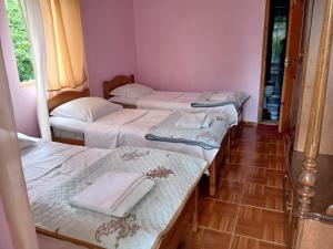 Postel nebo postele na pokoji v ubytování Guest house LIA