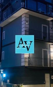 aaa sign on the side of a building at Al Vicolo Comfort Room in SantʼAgata di Militello