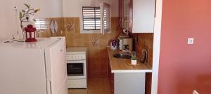 Kuchyň nebo kuchyňský kout v ubytování Apartmani Alaga B