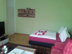 Ένα ή περισσότερα κρεβάτια σε δωμάτιο στο Ferienwohnung Burgblick