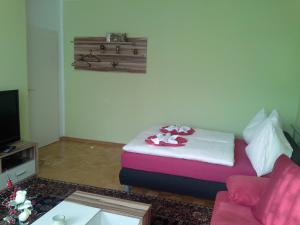 Postel nebo postele na pokoji v ubytování Ferienwohnung Burgblick