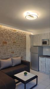 Kuchyň nebo kuchyňský kout v ubytování Gea luxury apartment Myrina 1