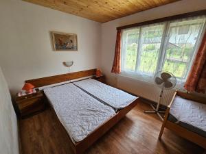 Postel nebo postele na pokoji v ubytování Chalupa Kuks