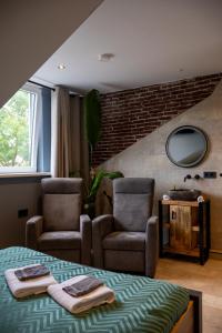 Posezení v ubytování Zeeschelp - Comfortabele kamer bij B&B Gezond aan Zee - Toegang Wellnesstuin meerprijs
