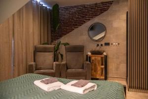 Postel nebo postele na pokoji v ubytování Zeeschelp - Comfortabele kamer bij B&B Gezond aan Zee - Toegang Wellnesstuin meerprijs