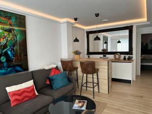 Et opholdsområde på La Cala Penthouse Retreat