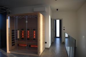 a glass shower in a room with a staircase at Villa M&M in Ližnjan +46 photos