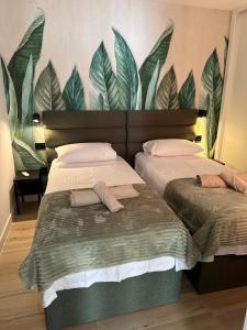 En eller flere senge i et værelse på La Cala Penthouse Retreat