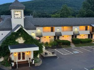 an aerial view of a hotel with a parking lot at The Black Mountain Inn in Brattleboro
