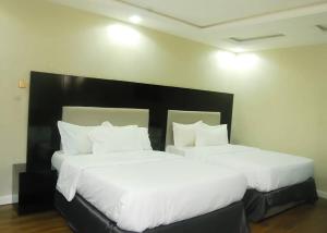 Letto o letti in una camera di LaSem Haven