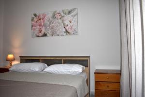 Postel nebo postele na pokoji v ubytování Sunny Beach Front Apartment