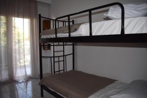 Postel nebo postele na pokoji v ubytování Sunny Beach Front Apartment