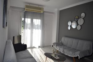 Posezení v ubytování Sunny Beach Front Apartment