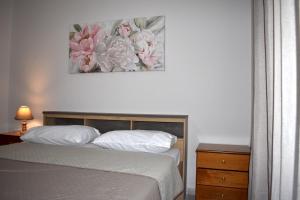 Postel nebo postele na pokoji v ubytování Sunny Beach Front Apartment